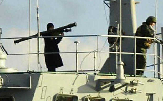 Crewman of Russian Ship Brandishes Rocket Launcher